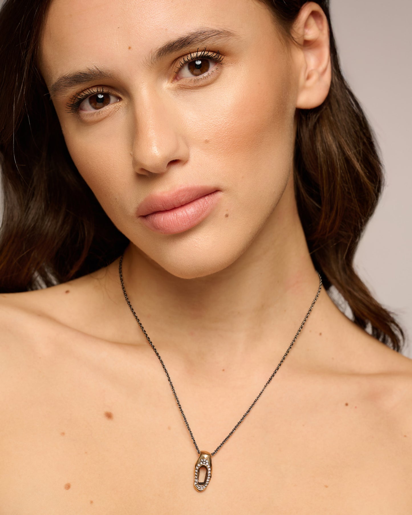 Catena Heathrow bronzo zirconi