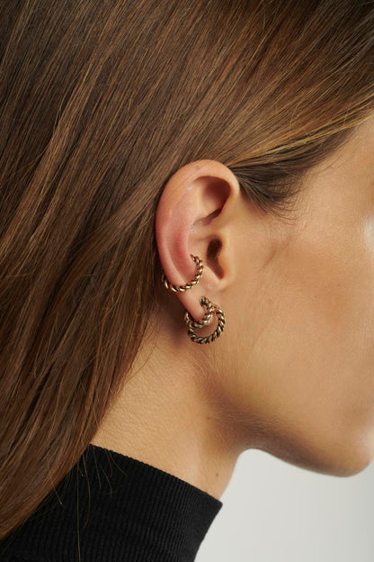Piercing mezza treccia bronzo