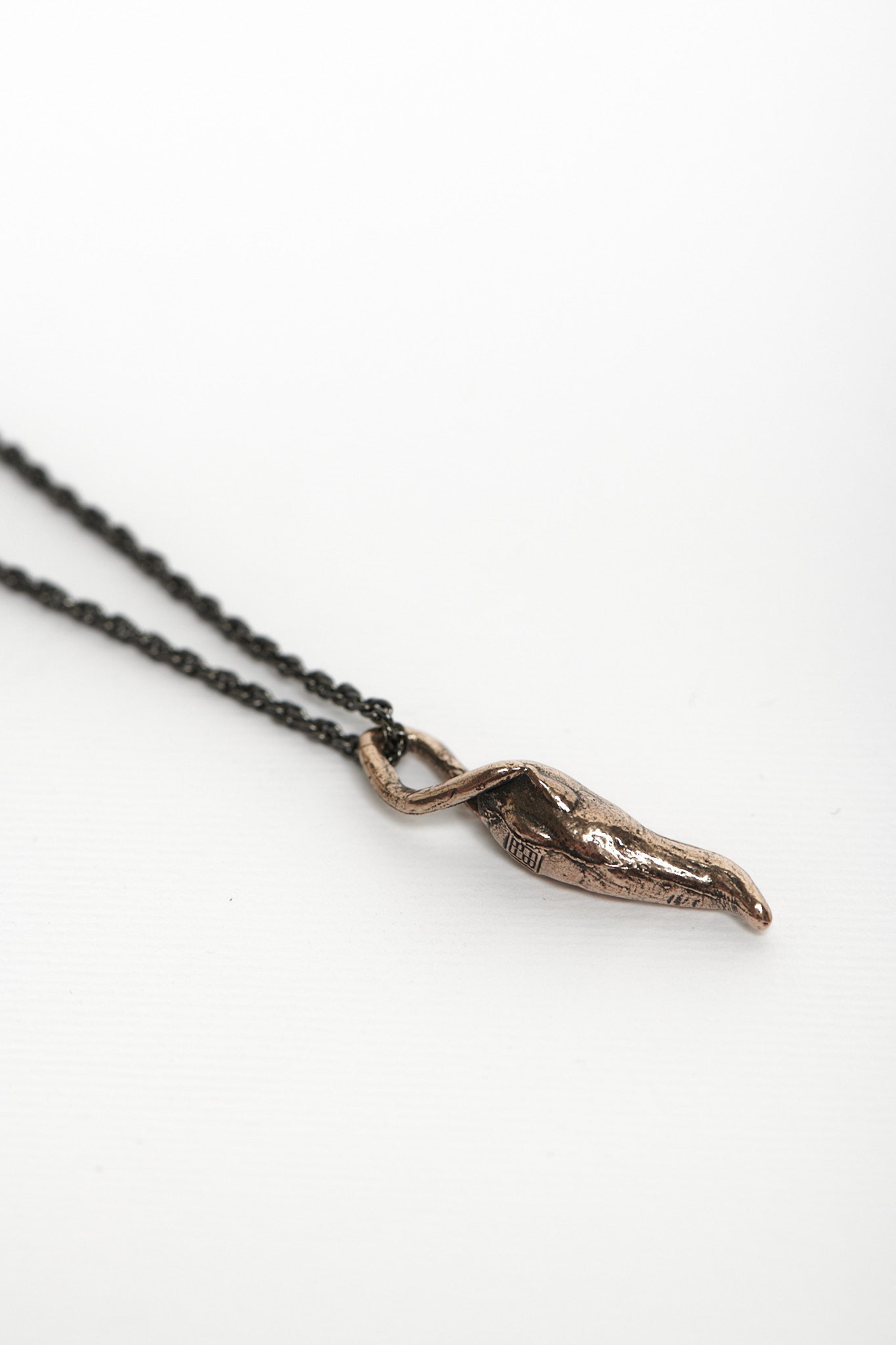 Collana corno zada bronzo