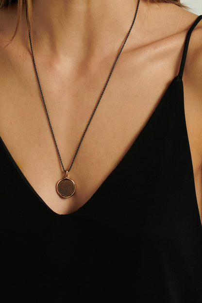 Collana moneta zada bronzo