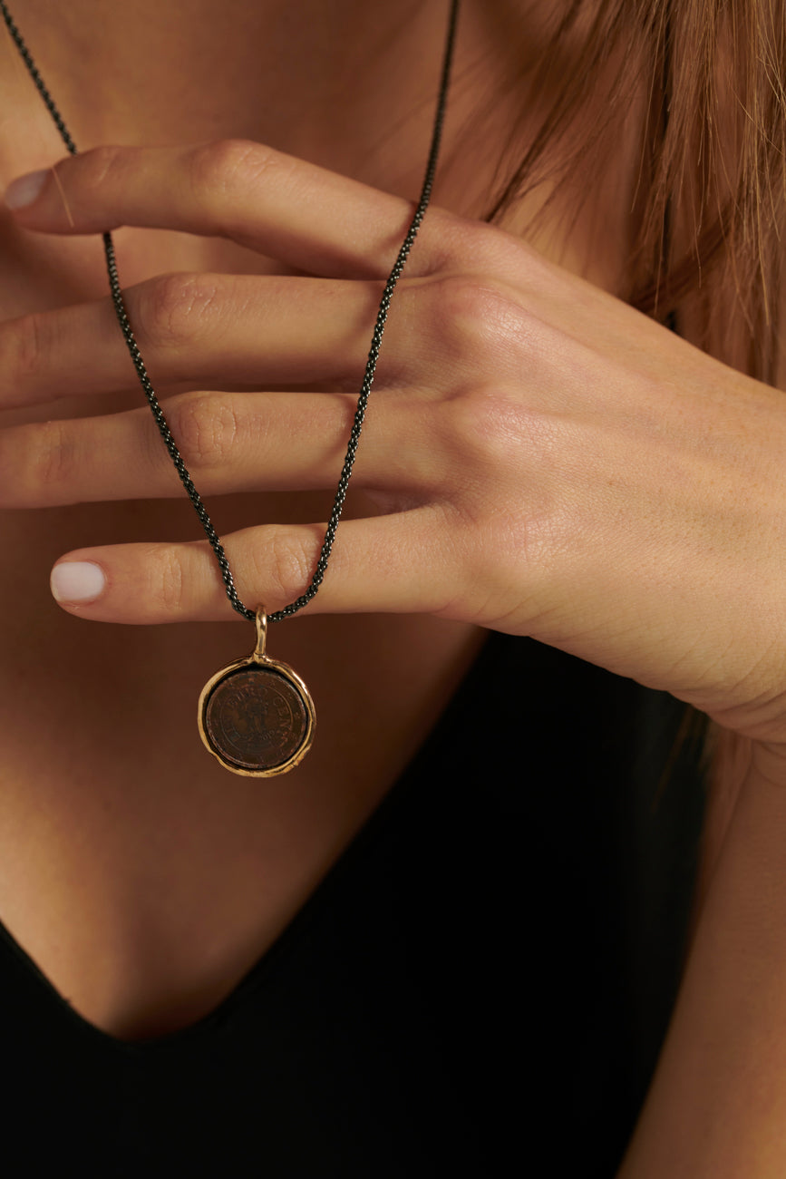 Collana moneta zada bronzo