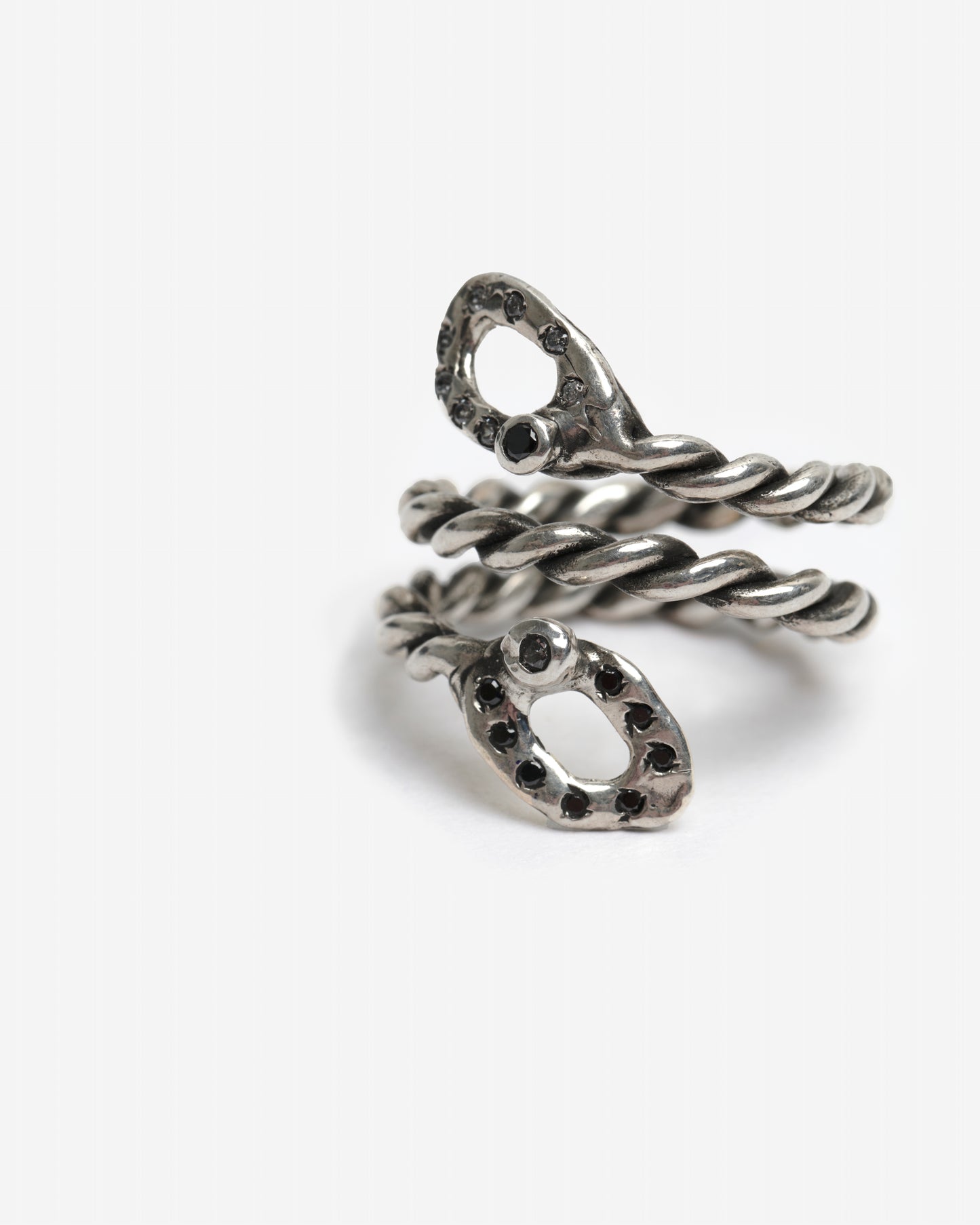 Anello spirale diploid zirconi bianchi e neri argento